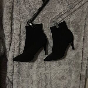 Sleek Black High-Heeled Ankle Booties